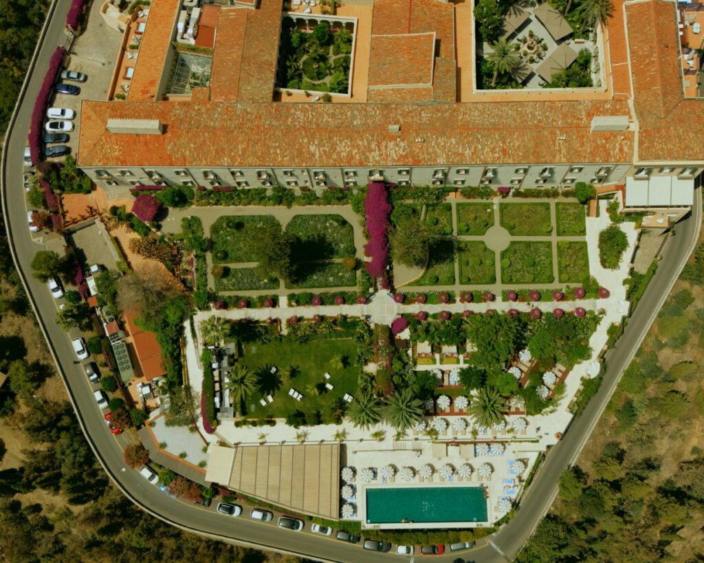 Luxury hotel with pool and garden in Taormina, Italy.